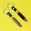 Hot sale Car motorcycle Carbonfiber Carbon fiber exhaust pipe keychain Key chain Tailpipe Muffler Keyring
