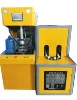 Manual preform loading type bottle blow moulding machine