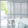 White Bifold Plantation Shutter With Track System
