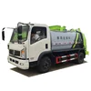 Sinotruk 6*4 low price container detachable garbage truck skip loader garbage truck arm-hook