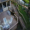 Luxury curved wood staircase with landing