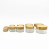 /product-detail/5g-15g-30g-50g-100g-4-oz-clear-frosted-glass-jar-with-bamboo-lid-cosmetic-62076151233.html