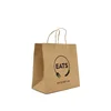High quality brown kraft paper shipping bag for clothes customized logo printing paper bag suppliers