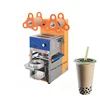 Prices for plastic fruit juice drink tea cup sealing machine
