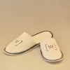 hot sale disposable hotel room slippers with customized logo and sponge heels