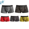 /product-detail/advanced-customization-high-quality-plus-size-thick-cotton-plaid-printed-underwear-men-boxer-briefs-62078056807.html