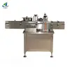 Sticker orientation labeling machine for plastic bottles