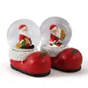 Promo custom LED Christmas Water Globe Santa Claus Snow Ball Christmas Stocking Base resin polyresin red crystal shoe snow globe