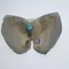 Freshwater oyster zircon shells blue and purple two cubic zircons are transported in vacuum-packed oysters