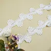 The latest embroidery design small white polyester Nigerian lace lace trim for wedding decoration