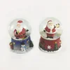 /product-detail/best-price-polyresin-base-santa-christmas-water-globe-65mm-dia-crystal-snow-globe-62084611874.html
