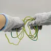 Breathable back and wing thumb design PU dipped gloves