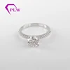 Simple design 1.5 ct round moissanite 18k white gold engagement ring with small moissanite stones paved on band