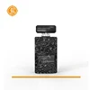 Black square perfume bottle with white pattern