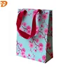 /product-detail/china-fancy-paper-bag-printing-with-grosgrain-ribbon-handle-60623759502.html