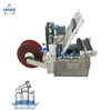 Semi-automatic labeling machine round glass bottle aerosol can label applicator mt-50 wet glue sticker flat vial bottle manual