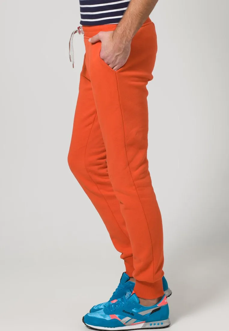 pantalones reebok hombre naranja