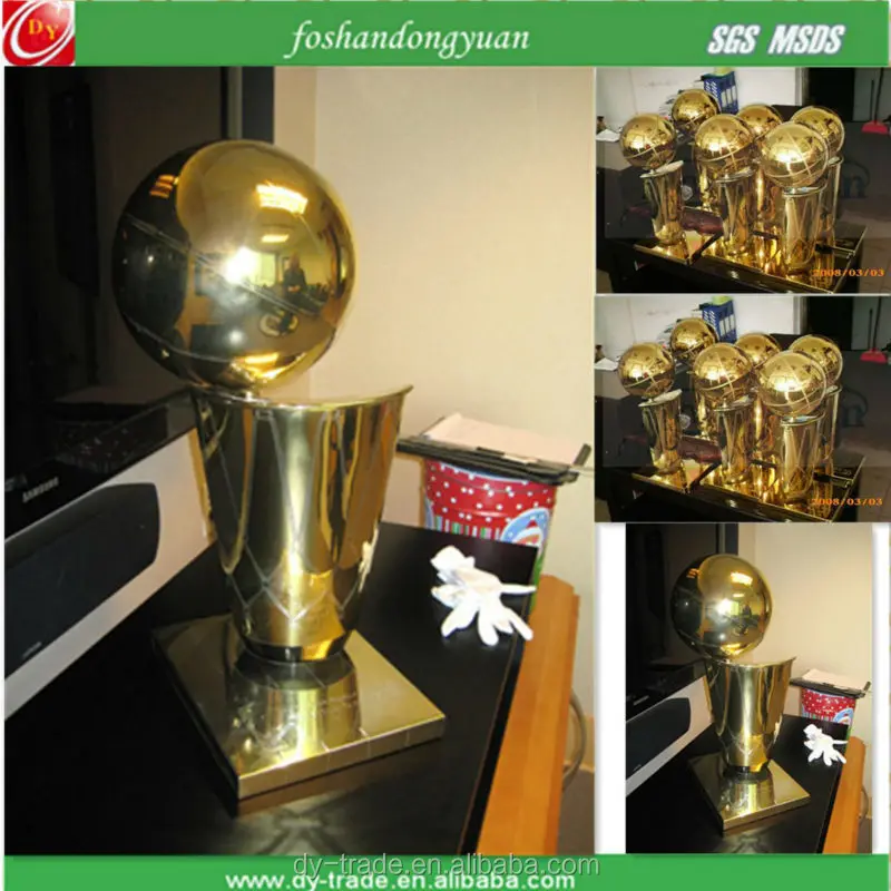 gold plated metal football trophy