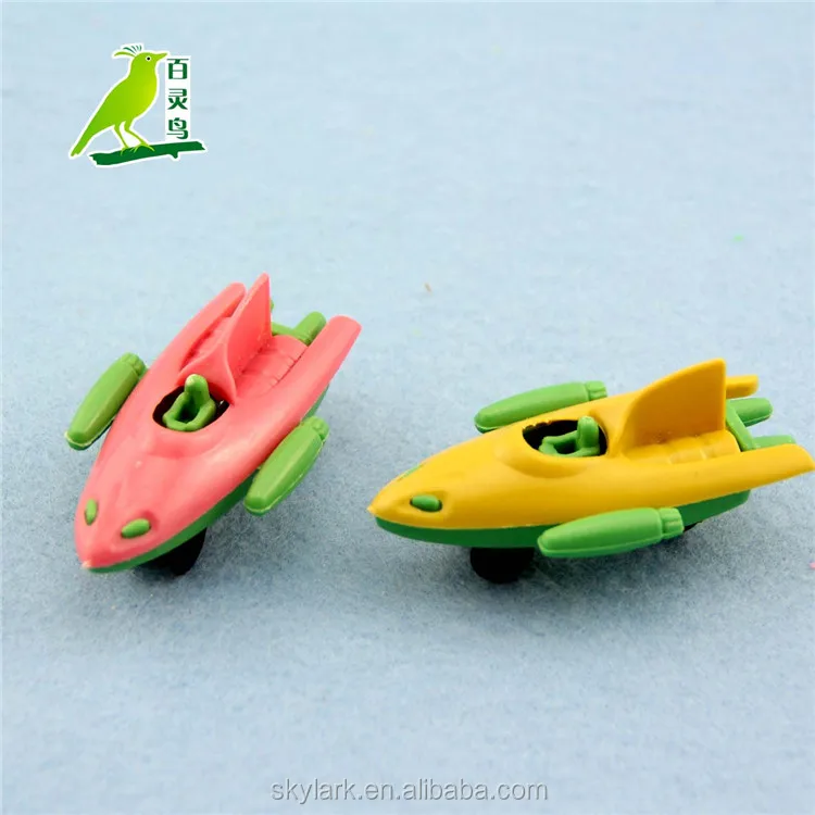 small plastic toy boats