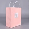 2018 Wholesale custom printed kraft pink clothes paper shopping gift jewelry packaging cosmetic bag logo with twist handle