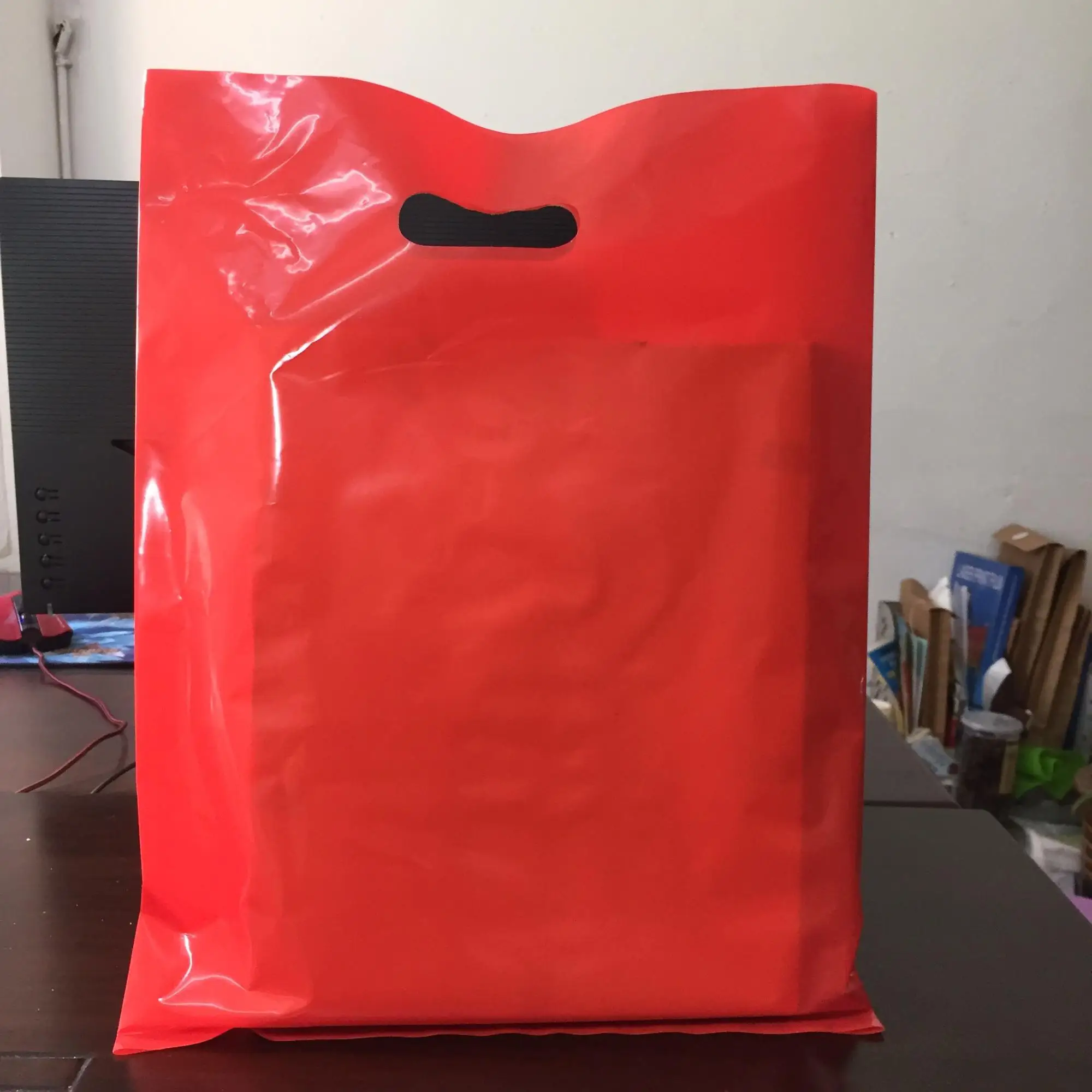 Oem Custom Logo Patch Handle Plastic Packaging Bag - Buy Plastic Bag
