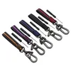 High-grade horseshoe button car keys anti-loss mobile phone number men and women couples leather waist hanging metal keys