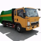 Sinotruk Howo 4 × 2 5 トンコンパクタごみトラックニューパワー 6 ホイールごみコンパクタトラック価格