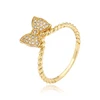 12144 Xuping newest designs knot shape insert rhinestone finger ring for women