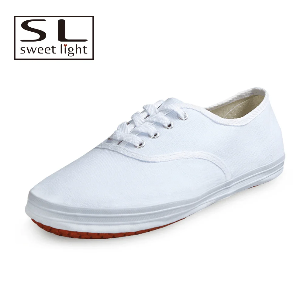white flat canvas shoes