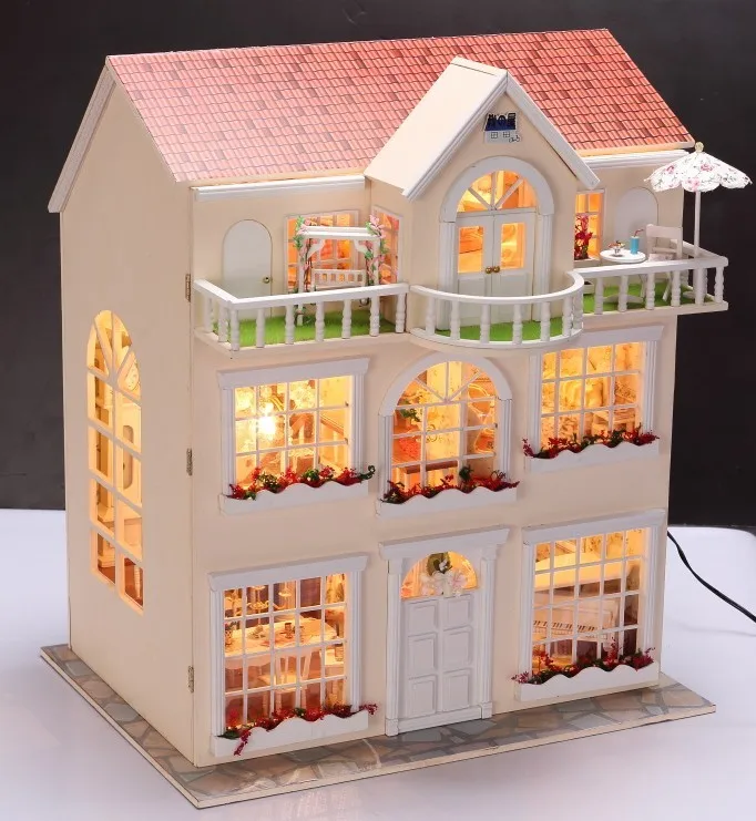 wooden dolls house with lights