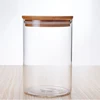 Handblown clear glass jar with wooden lid for food storage