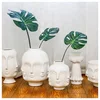 /product-detail/chinese-modern-porcelain-home-hotel-goods-decoration-flower-vase-types-of-face-designs-decorative-ceramic-vase-for-home-decor-60772205991.html