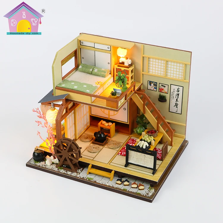 wooden dolls house with lights