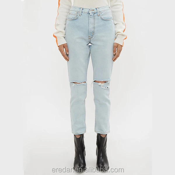 jeans with rips in the front and back
