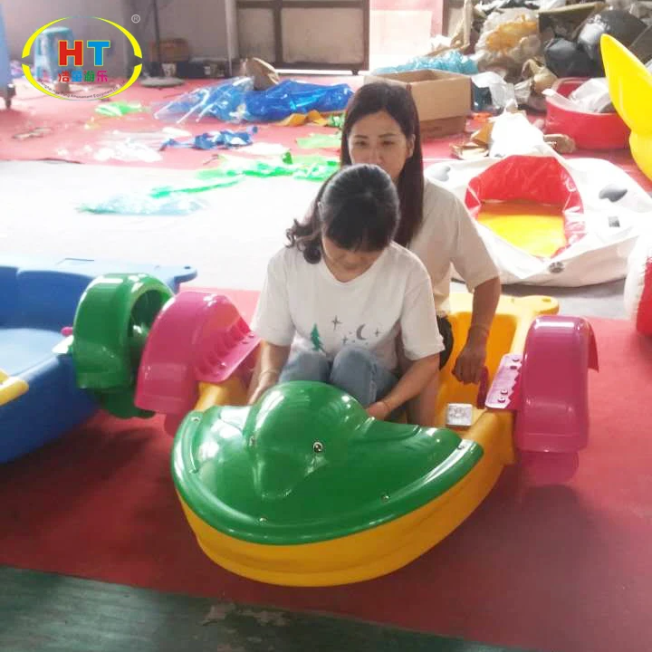 Haotong cheap plastic small hand pedal boat kids mini hand paddle boats