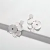 White spray-painted alloy multi-layer disc drop statement designer inspired earrings