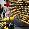 Interactive wall play ball art black and yellow ball song borad london