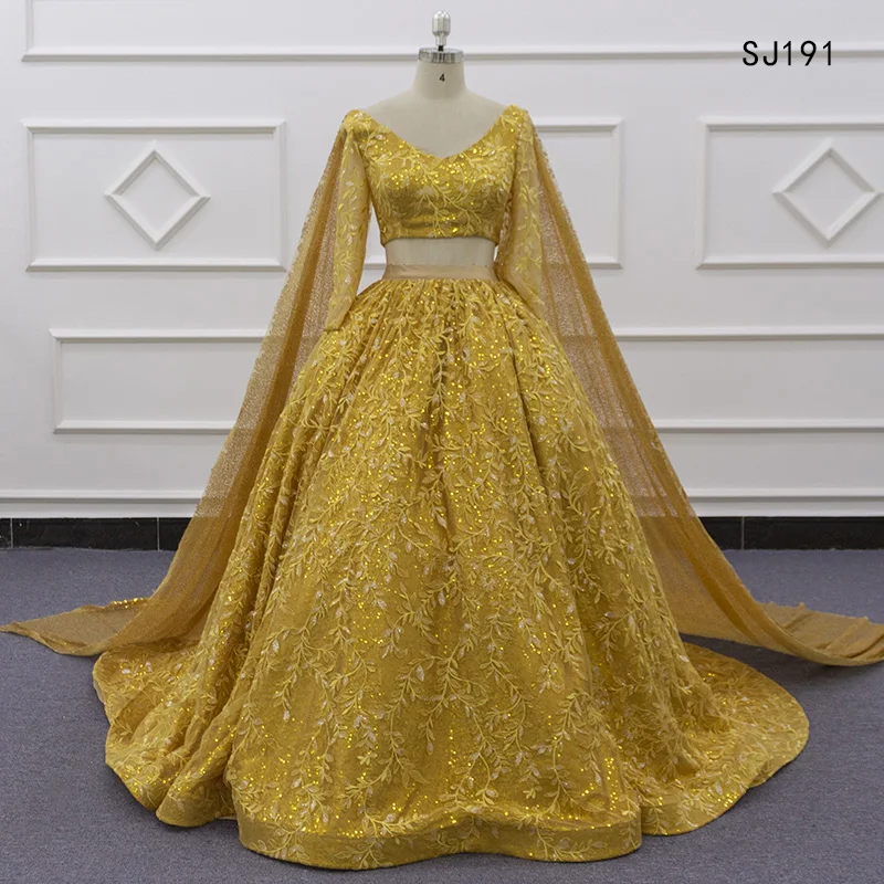 gold long sleeve ball gown