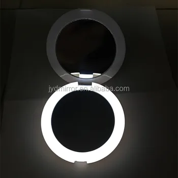 magnifying cosmetic mirror with light