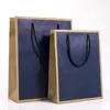 OEM Custom Luxury Gift Craft Shopping White Kraft Paper Bag With Handle Manufacturer
