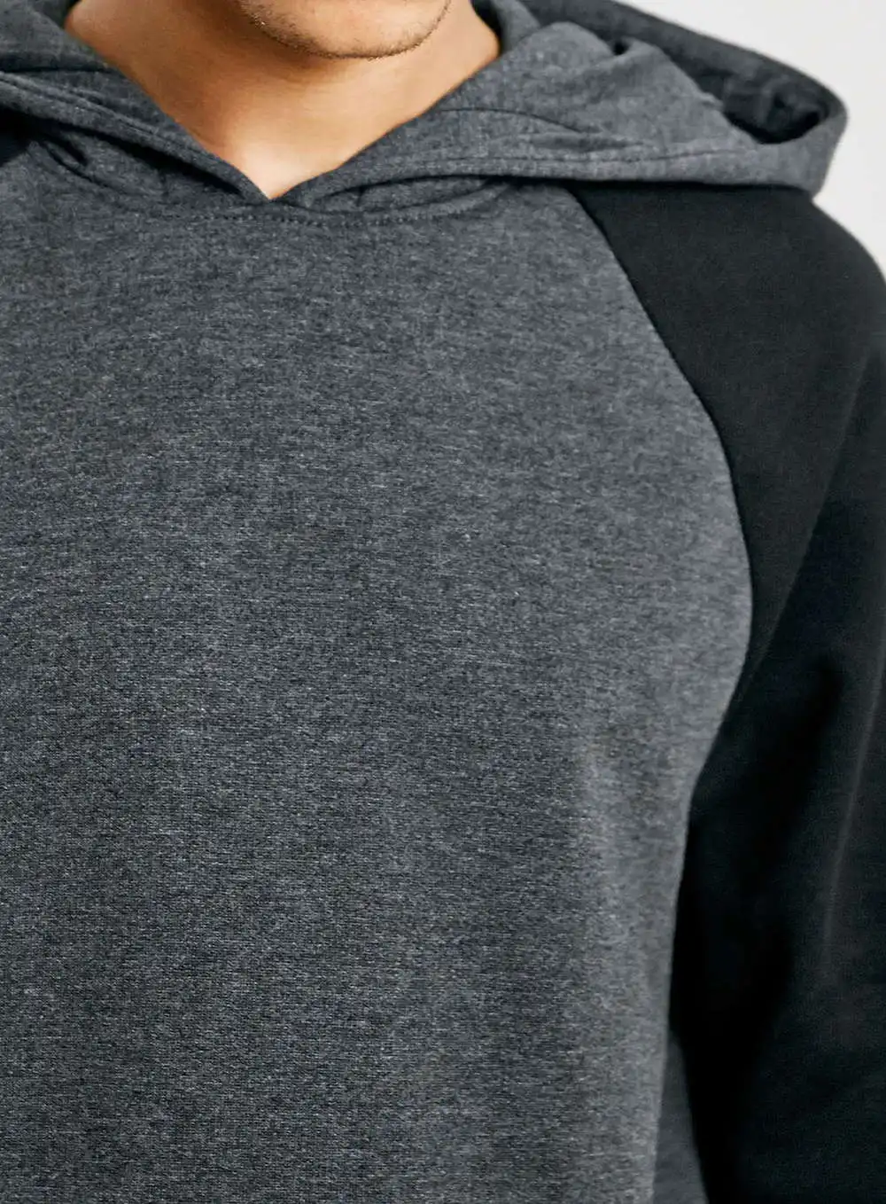 grey hoodie with black sleeves