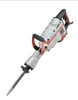 Industrial high power electric pick is used to break down wall with concrete