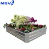 Raised garden beds in corrugated veggie and flower