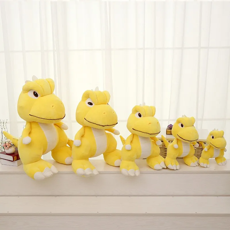 yellow stuffed dinosaur