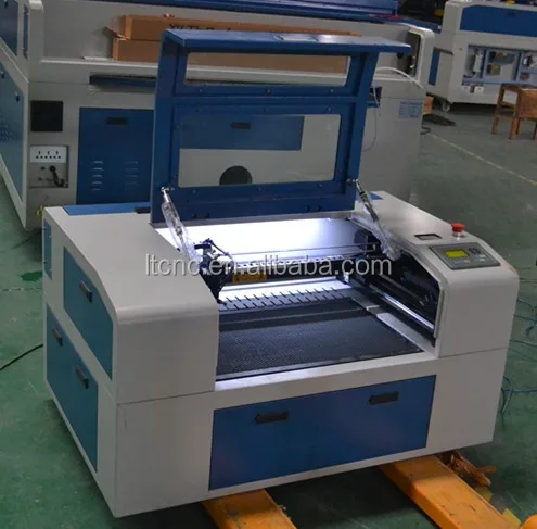 Fashionable acrylic wood MDF plexiglass denim jeans laser engraving machine CNC laser machine 6040