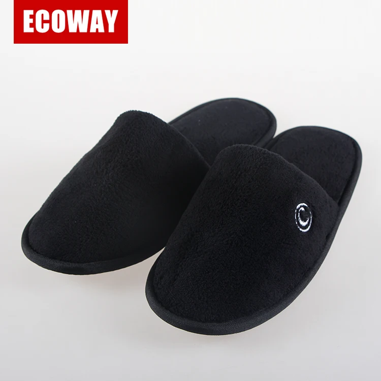 black hotel slippers