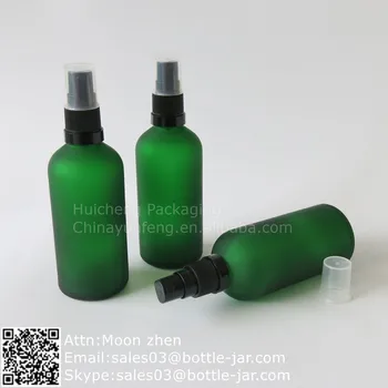 green glass spray bottle