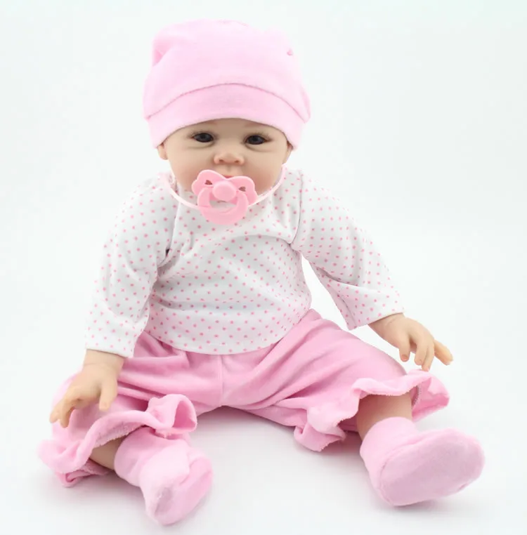 baby doll with pacifier