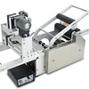 semi automatic e liquid round bottle glass bottle labeling machine with date coding