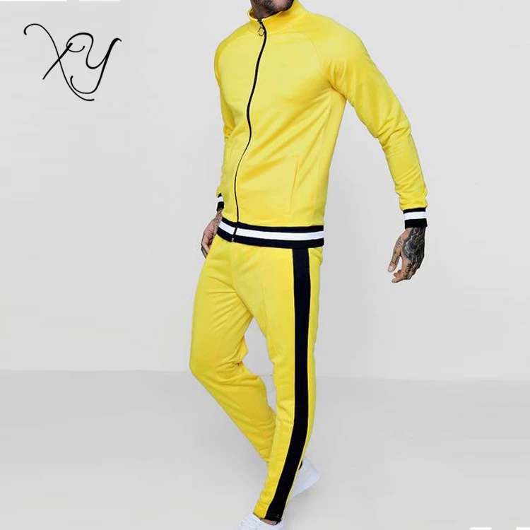 yellow joggers with black stripe